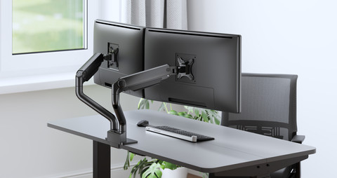 Neomounts NEXT One DS70S-950BL2 Monitorarm voor 17-35" schermen - Zwart product in gebruik