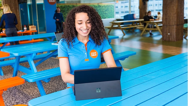 Expert happily working with their Second Chance laptop