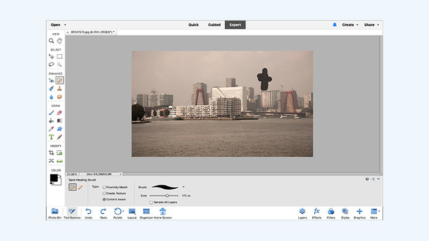 Brush away distracting elements with the Healing Brush tool.