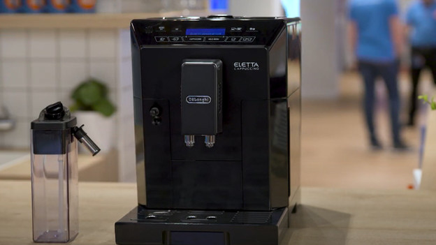 Click the milk reservoir onto the machine