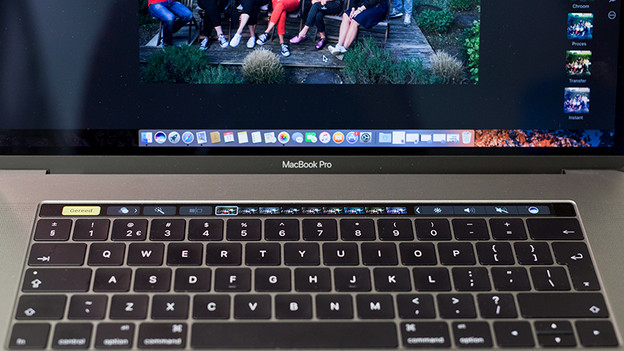 Edit photos on Touch Bar MacBook.