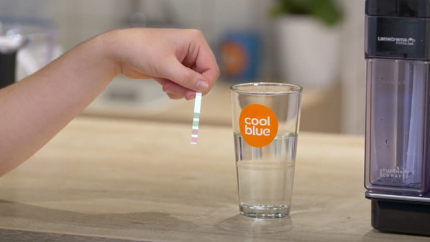 Stel de waterhardheid in