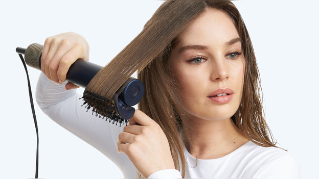 Wil je zonder vermoeide arm je haar drogen?