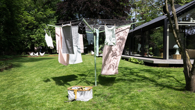 Ground anchor umbrella drying rack