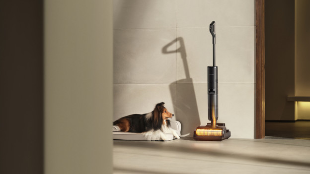 What are the benefits of a self-cleaning vacuum mop?