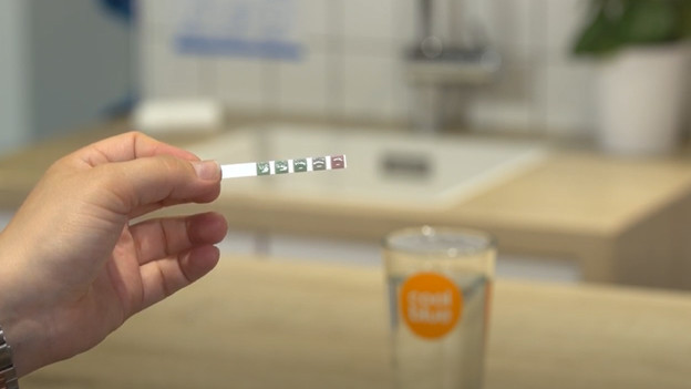 Stel de waterhardheid in