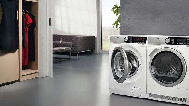Washing machine next to each other in a living room.