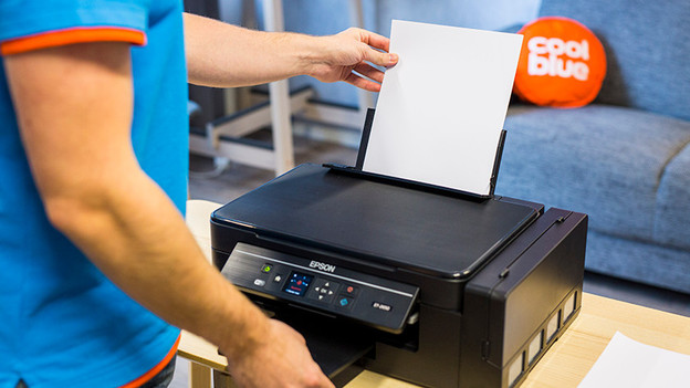 Expert works with printer