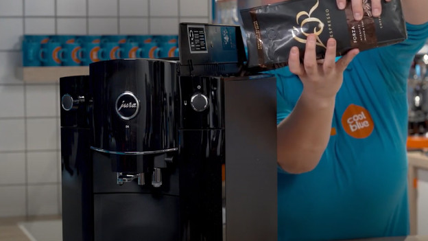 Put the coffee beans in the bean hopper