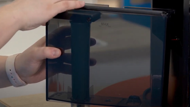 Place the water filter in the water tank