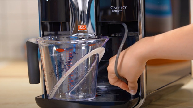 Spoel de machine door