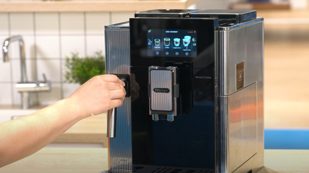 Insert the hot water spout