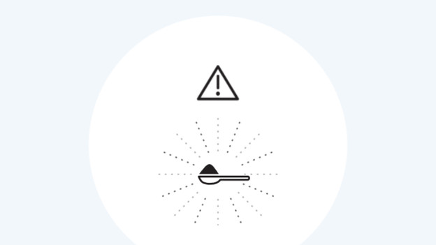 Koffieschep + uitroepteken symbool