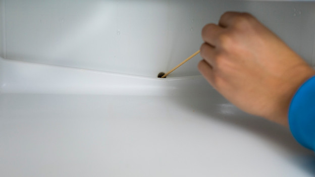 Drain hose in fridge