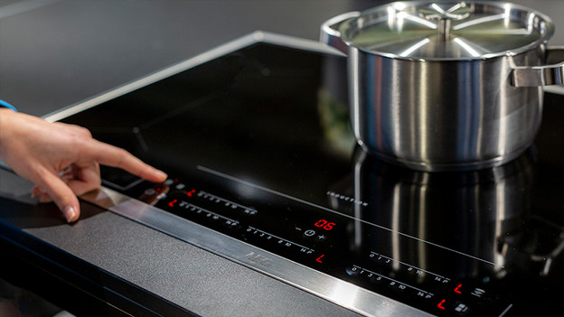 Sensor buttons AEG cooktop