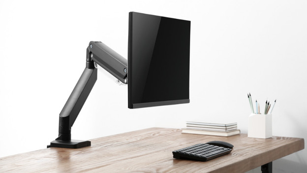 A Neomounts monitor arm with gas spring