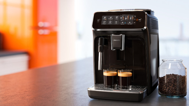 coffee machine with cups of coffee