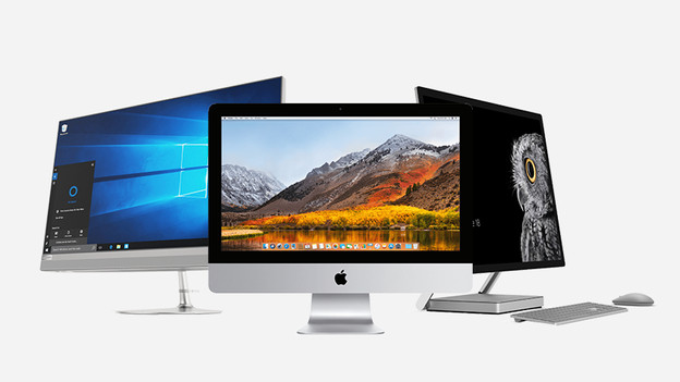 Three all-in-one computers side by side.