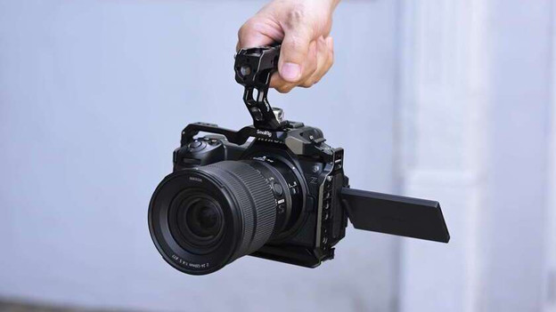 Systeemcamera handvat