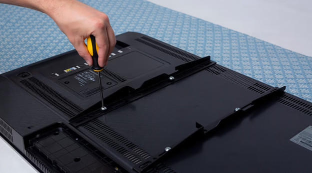 Step 3: lift the TV off the mount