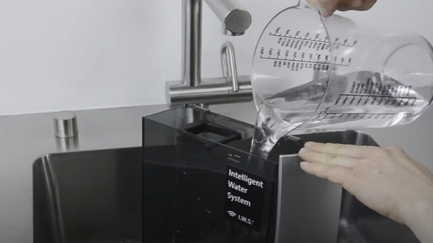 Pour the water in the water tank