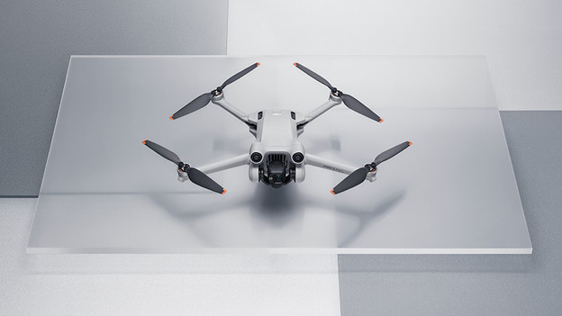 The DJI Mini Pro on glass.