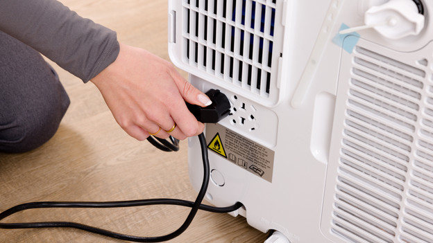 Disconnect air conditioner from power