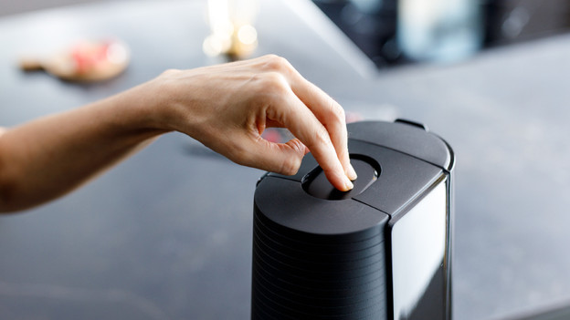 Press SodaStream button