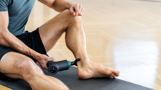 Massage gun met veel opzetstukken