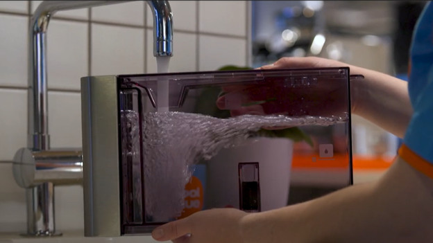 Vul het waterreservoir