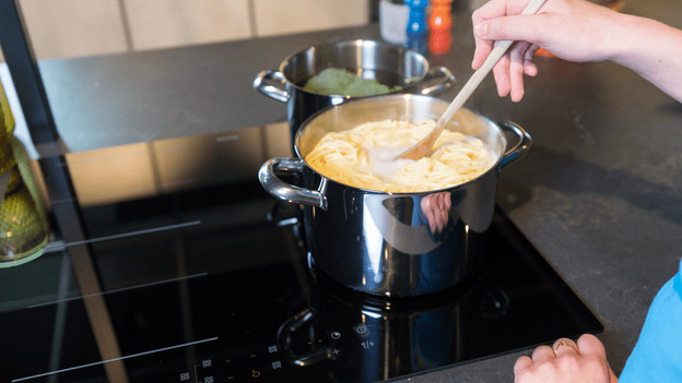 Pan with water and pasta