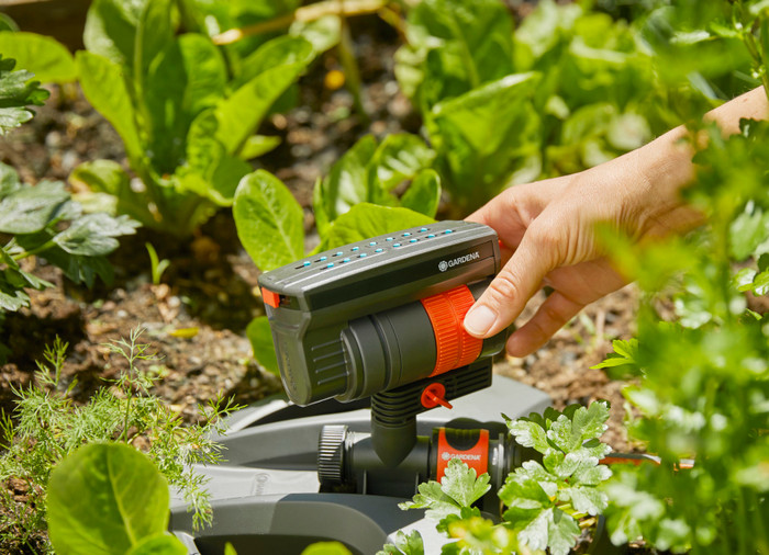 Gardena Zwenksproeier AquaZoom Compact product in gebruik