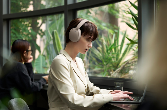 Sony WH-CH735N Cream product in use