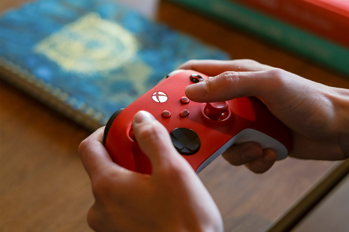 Microsoft Xbox Series X and S Wireless Controller Red product in use