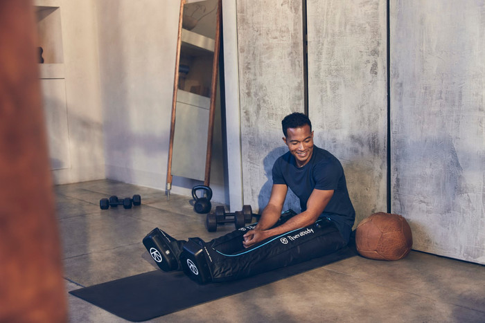 Therabody RecoveryAir JetBoots Medium product in use