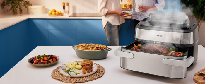 Philips Airfryer 5000 serie Megabasket NA565/02 product in gebruik