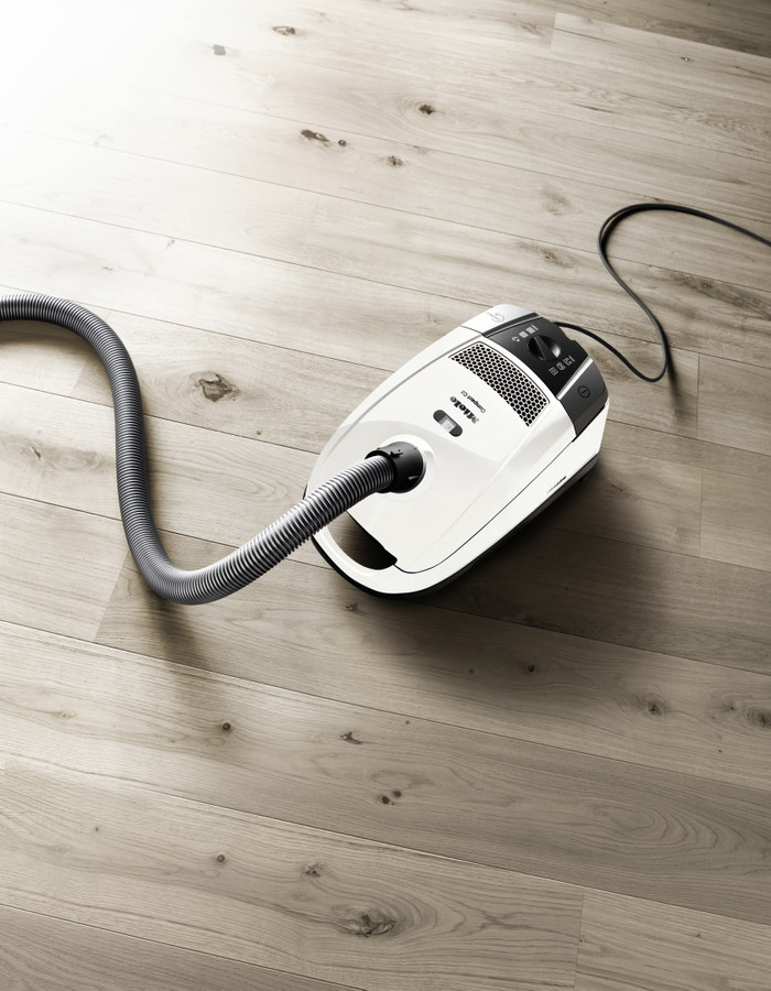 Miele Compact C2 Silence EcoLine Lotus White product in use