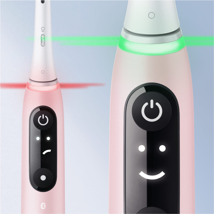 Oral-B iO Series 6N Light Pink + Extra iO Gentle Care Brush Attachment product in use