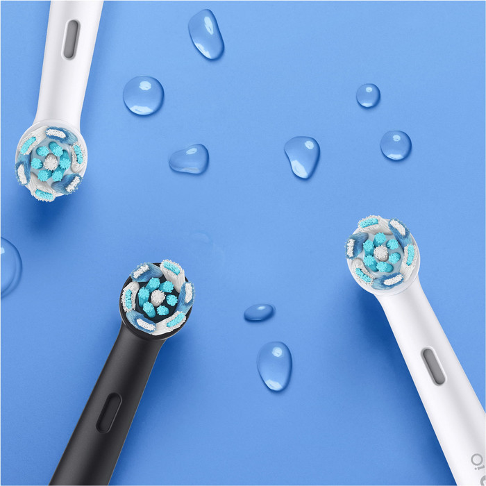Oral-B iO Series 6N Light Pink + Extra iO Gentle Care Brush Attachment product in use