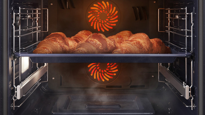 Samsung NV7B4540VAK Dual Cook Flex product in use