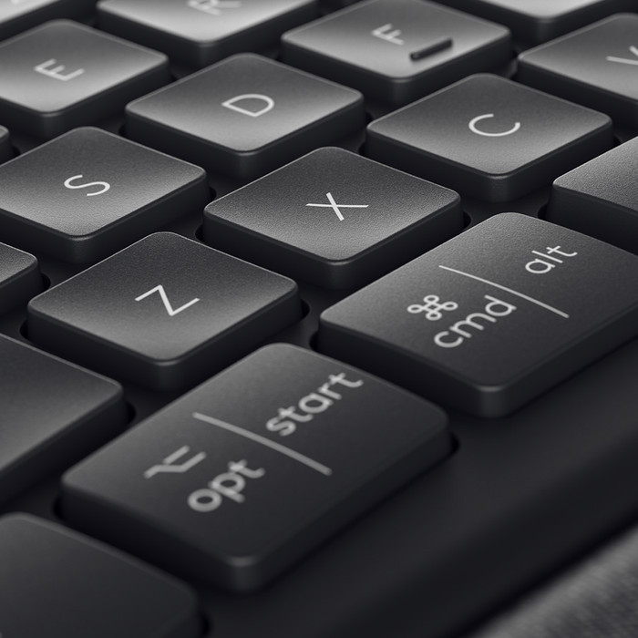 Logitech K860 + Logitech MX Vertical Ergo Mouse null