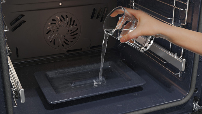 Samsung NV7B4550VAK Dual Cook Flex product in use