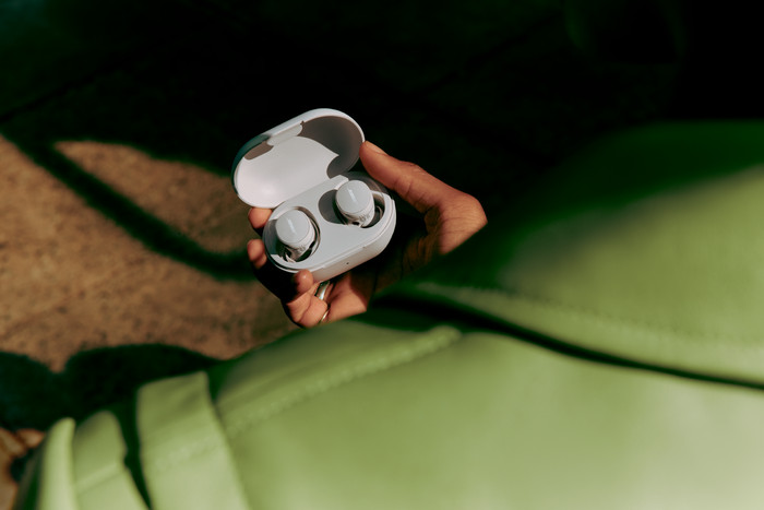 Bose QuietComfort Earbuds Cream product in use