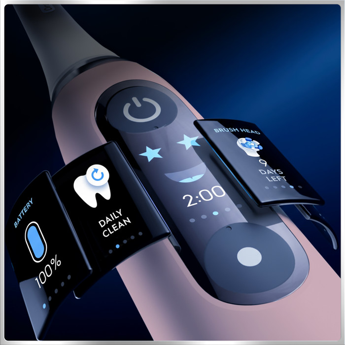 Oral-B iO Series 6N Light Pink + Extra iO Gentle Care Brush Attachment product in use