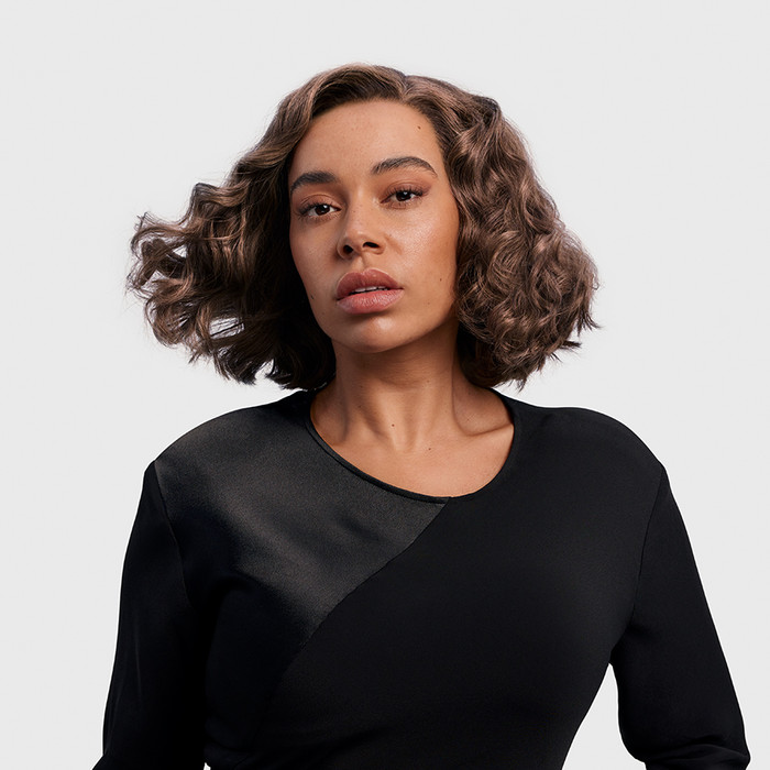 Dyson Airwrap i.d. Straight + Wavy Red Velvet/Gold product in use