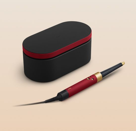 Dyson Airwrap i.d. Curly + Coily Red Velvet/Gold product in use