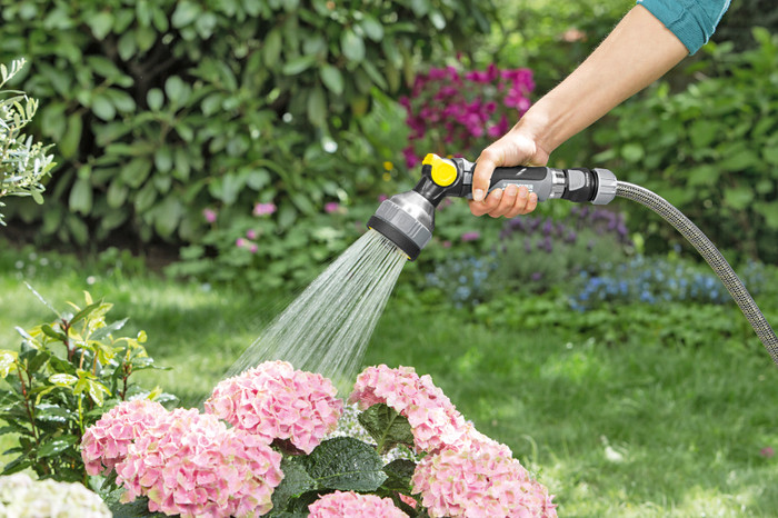 Karcher Slanghaspel HR 3.20 Set + Karcher Premium Multifunctioneel Spuitpistool product in gebruik