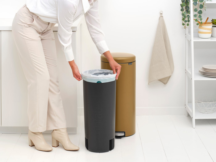 Brabantia NewIcon Pedal Trash Can 30L Warm Brass product in use