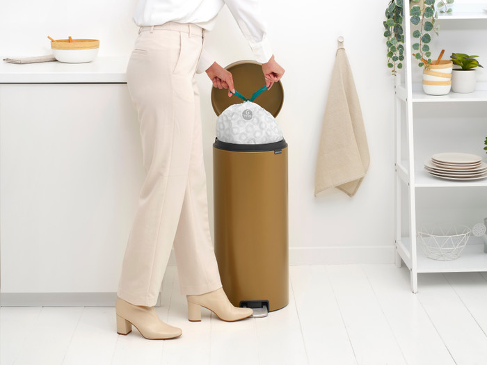 Brabantia NewIcon Pedal Trash Can 30L Warm Brass product in use