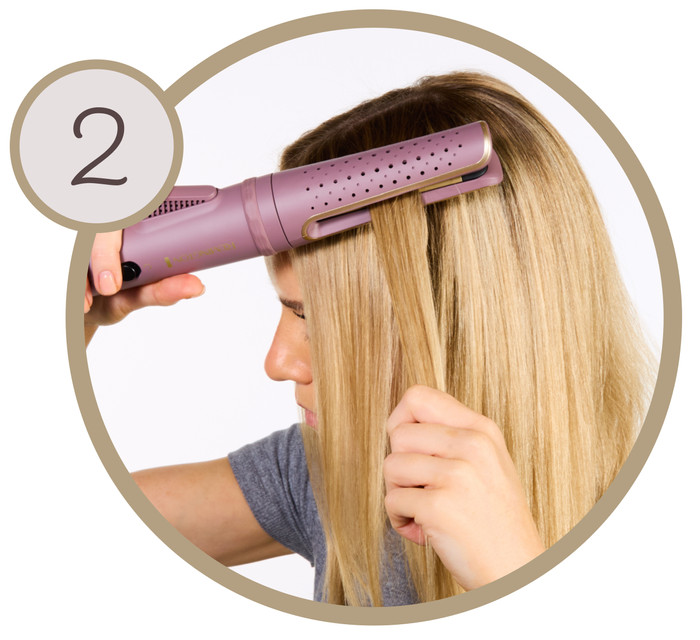 Remington AIRvive CI8930 product in use